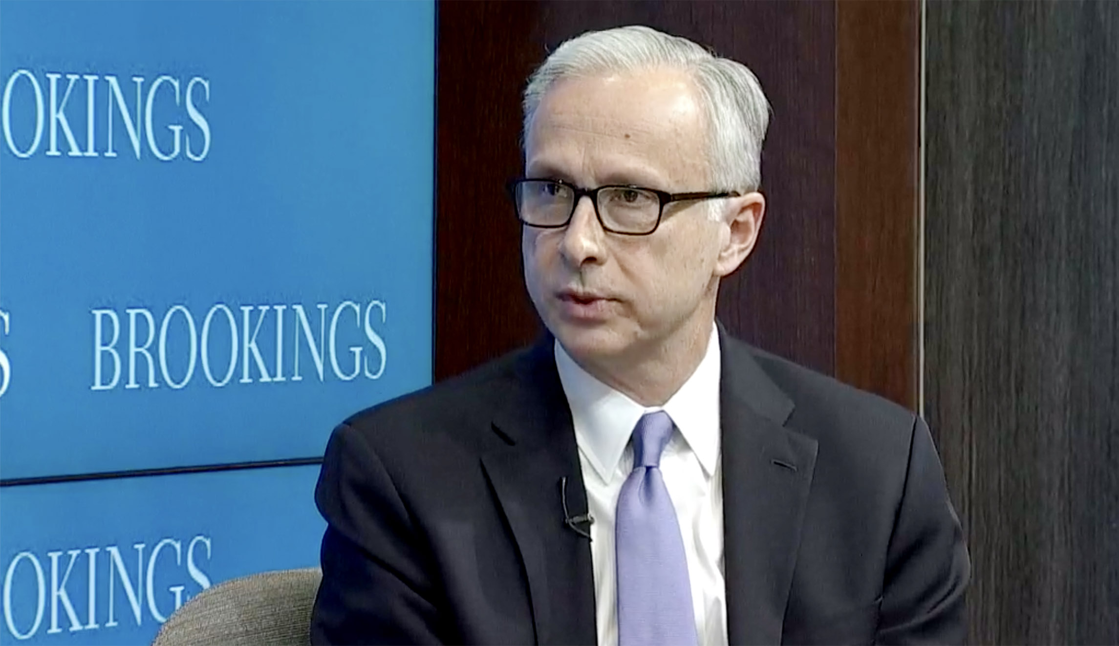 James Baker, a former FBI lawyer, is shown.